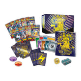 Pokémon trading card game set with cards, dice, and player's guide on a white background
